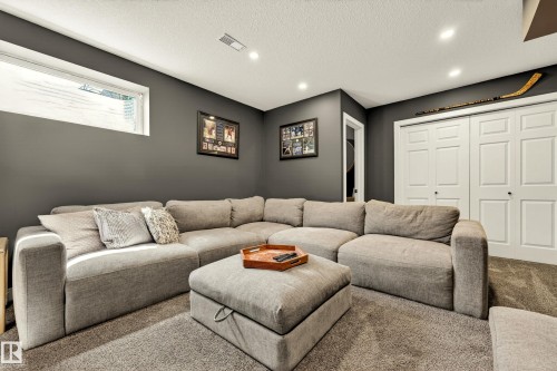 Recessed lighting illuminates this space featuring wall-to-wall carpeting and neutral-toned walls - 20507 128 Avenue, Edmonton, AB 