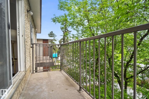 Private balcony featuring metal railings and a concrete floor - 204 12404 114 Avenue, Edmonton, AB - Outdoor With Balcony With Exterior