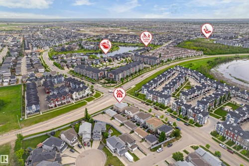 Aerial perspective showcasing a residential community with diverse housing types - 8204 180 Avenue, Edmonton, AB 