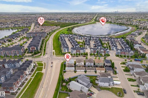 Aerial perspective showcasing a structured residential area with diverse housing styles - 8204 180 Avenue, Edmonton, AB 