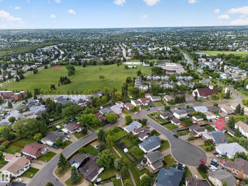 Sprawling residential area with extensive green spaces and mature trees - 34 Grand Meadow Crescent, Edmonton, AB 