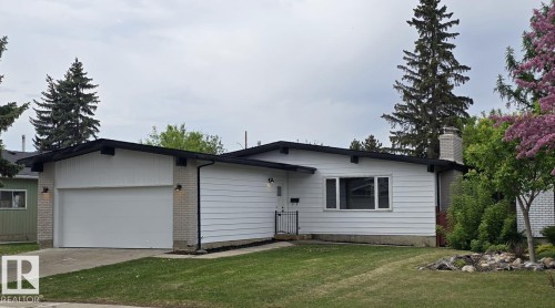 Ranch-style residence featuring white horizontal siding and a single-car garage - 18526 86A Avenue, Edmonton, AB - Outdoor