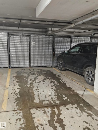Image quality insufficient for description - 439 300 Palisades Way, Sherwood Park, AB - Indoor Photo Showing Garage