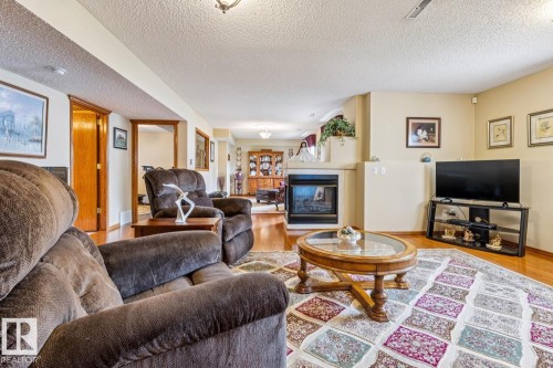 Spacious living area featuring laminate flooring, - 5131 152A Avenue, Edmonton, AB 