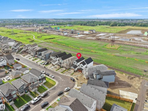 Aerial perspective showcasing a residential street with multiple detached homes - 19316 29 Avenue, Edmonton, AB 