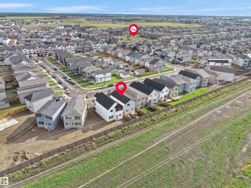 Aerial perspective showcasing a residential neighborhood with varied housing styles - 19316 29 Avenue, Edmonton, AB 