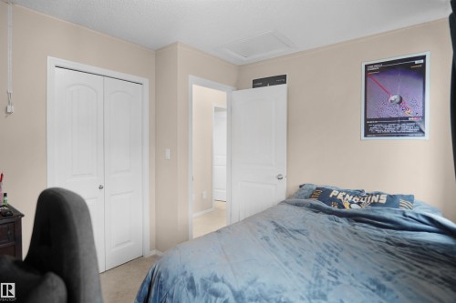 Neutral-toned interior with carpeted flooring - 292 Simmonds Way, Leduc, AB 