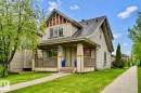 Two-story home with a prominent gabled roofline and an inviting covered porch - 1804 121 Street, Edmonton, AB 