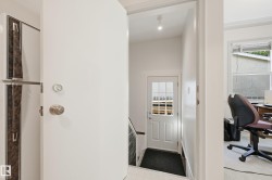 Side door. Also separate entrance for basement suite. - 