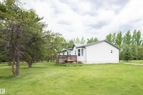 Property exterior - 209 5128 Highway 18, Rural Barrhead County, AB 