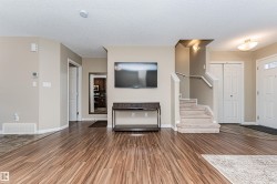 Wood-finish flooring throughout the main living area - 