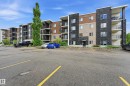 Multi-story residential building featuring a stone and siding exterior - 304 11804 22 Avenue, Edmonton, AB 