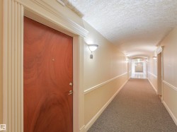 Entry door with fluted casing and detailed crown molding - 