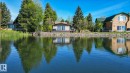 98 Argentia Beach, Rural Wetaskiwin County, AB  - Outdoor With Body Of Water 