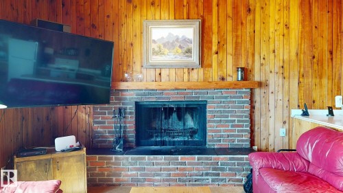 98 Argentia Beach, Rural Wetaskiwin County, AB - Indoor With Fireplace