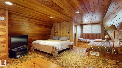 98 Argentia Beach, Rural Wetaskiwin County, AB - Indoor Photo Showing Bedroom