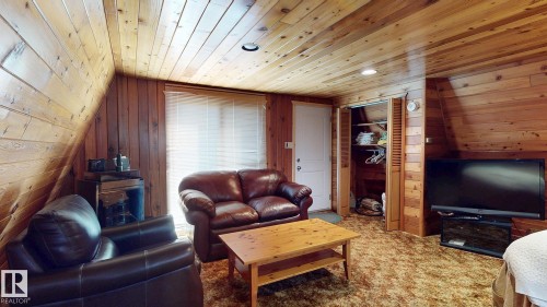 98 Argentia Beach, Rural Wetaskiwin County, AB - Indoor Photo Showing Living Room