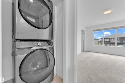 Integrated stackable laundry appliances in a dedicated closet - 1534 157 Street, Edmonton, AB 