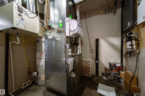 Central HVAC unit, hot water heater, and various utility connections - 14508 78 Avenue, Edmonton, AB 