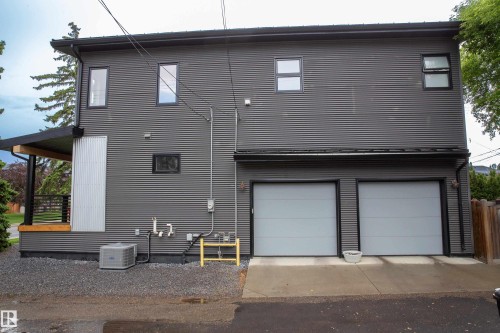 Modern exterior featuring corrugated metal siding - 14508 78 Avenue, Edmonton, AB 