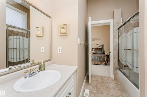Vanity with integrated sink and chrome faucet - 116 Darlington Crescent, Edmonton, AB 