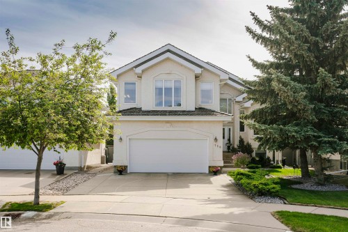 Contemporary two-story residence featuring a neutral stucco exterior - 116 Darlington Crescent, Edmonton, AB 