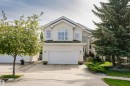 Contemporary two-story residence featuring a neutral stucco exterior - 116 Darlington Crescent, Edmonton, AB 