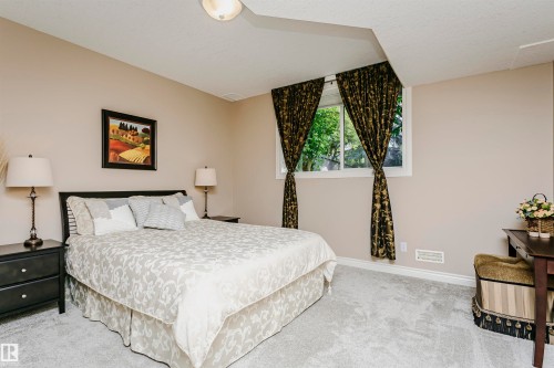 Neutral-toned walls complement the light-colored carpeting - 116 Darlington Crescent, Edmonton, AB 