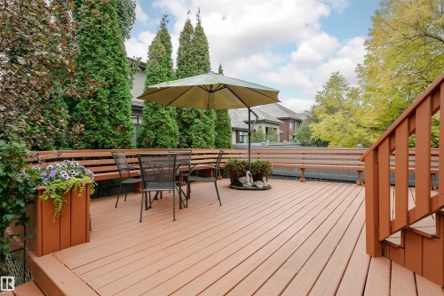 Spacious outdoor deck featuring natural wood-finish decking - 116 Darlington Crescent, Edmonton, AB 