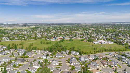 Aerial perspective showcasing a residential area with cul-de-sacs and green spaces - 116 Darlington Crescent, Edmonton, AB 
