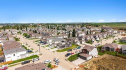 Modern residential development featuring single-family homes with diverse architectural styles and rooflines - 
