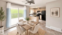 Dining area featuring a sliding glass door to an outdoor deck and a ceiling fan - 