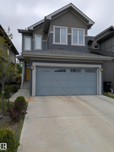 Two-story residence featuring a combination of horizontal siding and shake siding - 9240 224 Street Nw, Edmonton, AB - Outdoor
