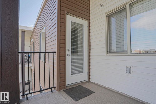 Private balcony featuring concrete flooring - 405 11804 22 Avenue Sw, Edmonton, AB 