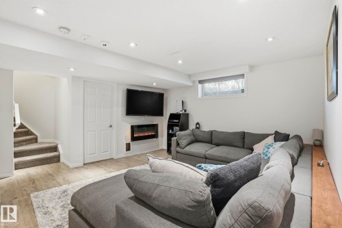 204 Sheppard Court, Edmonton, AB - Indoor Photo Showing Living Room With Fireplace