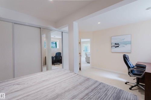 Room featuring light-toned carpet flooring and recessed lighting - 20524 58 Avenue, Edmonton, AB 