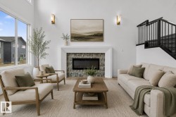 Spacious living room with soaring ceilings and abundant natural light - 