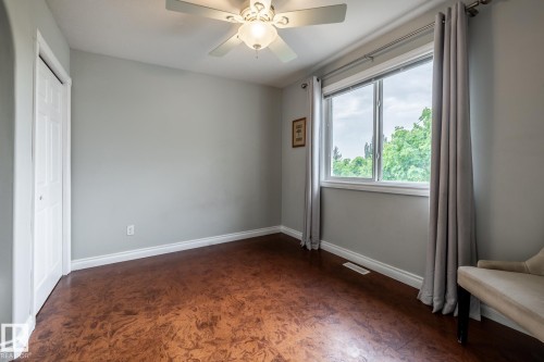 Bright room featuring wood-finish flooring and light gray walls - 2036 Towne Centre Boulevard, Edmonton, AB - Indoor Photo Showing Other Room