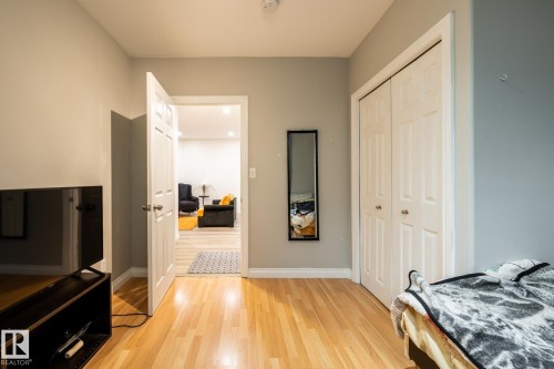 Hardwood-style flooring throughout - 2036 Towne Centre Boulevard, Edmonton, AB - Indoor Photo Showing Bedroom