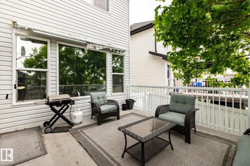 Outdoor patio space featuring a concrete surface and white railings - 2036 Towne Centre Boulevard, Edmonton, AB - Outdoor With Deck Patio Veranda With Exterior