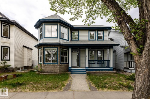 Light-colored siding exterior with dark trim accents - 2036 Towne Centre Boulevard, Edmonton, AB - Outdoor With Deck Patio Veranda With Facade