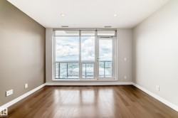 Floor-to-ceiling windows with a glass door provide extensive natural illumination - 