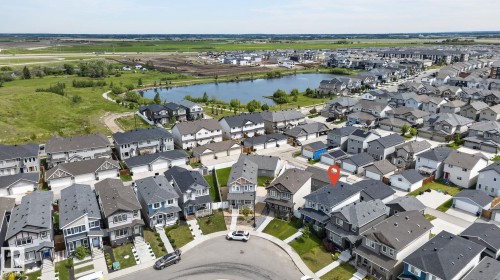 Modern residential neighborhood with a large central pond - 17733 64A Street, Edmonton, AB 