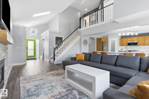 3948 42 Street, Edmonton, AB - Indoor Photo Showing Living Room With Fireplace