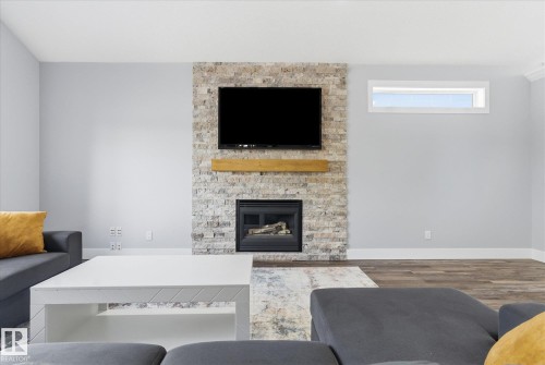 3948 42 Street, Edmonton, AB - Indoor Photo Showing Living Room With Fireplace