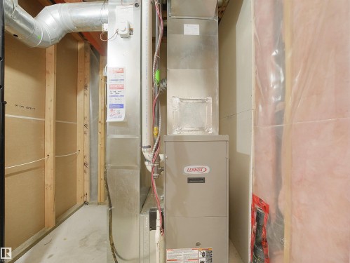 Lennox HVAC system, exposed ductwork, exposed electrical wiring, partially insulated wall, and concrete flooring - 21316 45A Avenue Nw, Edmonton, AB 