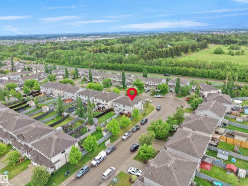 Aerial perspective showcasing a residential community with numerous detached and attached properties - 21316 45A Avenue Nw, Edmonton, AB 