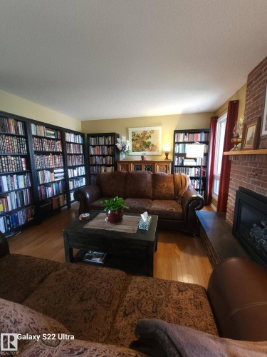 4419 43 Avenue, Leduc, AB - Indoor Photo Showing Living Room With Fireplace