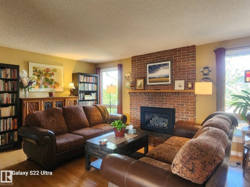 4419 43 Avenue, Leduc, AB - Indoor Photo Showing Living Room With Fireplace