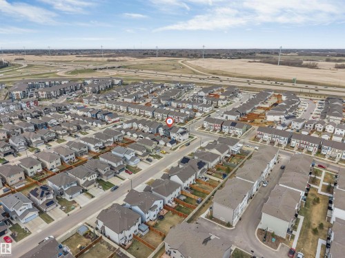 Aerial perspective showcasing a residential community with varied architectural styles - 2652 Maple Way, Edmonton, AB - Outdoor With View